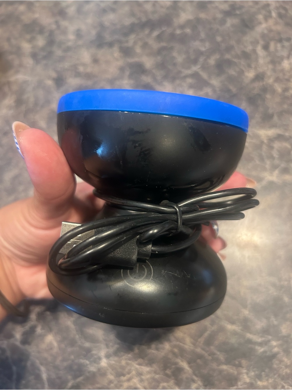 Portable Black Facial Cleansing Brush with Blue Trim
